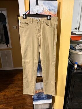 Check back pocket pictures. Torn. Peter Millar Slim Straight Jeans in khaki